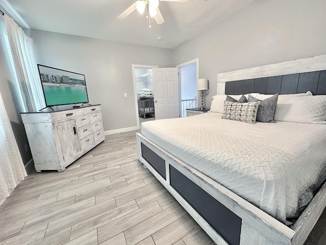 83 Sunfish St, Destin, FL 32541 - bedroom featuring light wood finished floors, ceiling fan, and a spacious closet