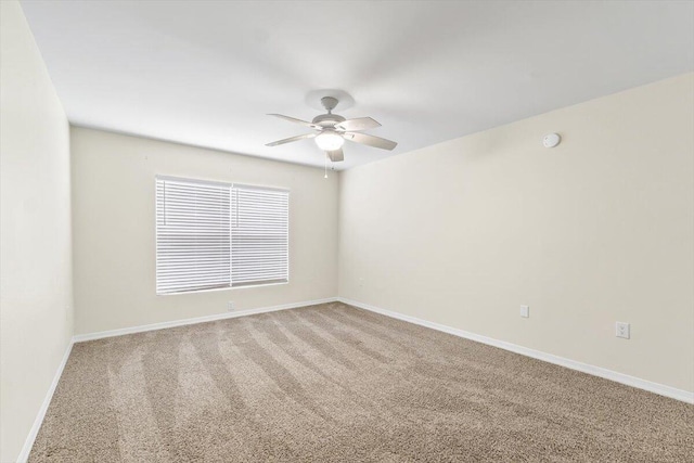 4276 Calinda Ln Apt 138, Niceville, FL 32578 - spare room featuring ceiling fan, carpet flooring, and a smoke detector