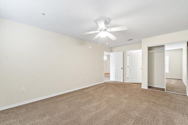 4276 Calinda Ln Apt 138, Niceville, FL 32578 - unfurnished bedroom with carpet, a closet, and a ceiling fan