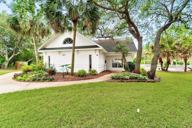 4276 Calinda Ln Apt 138, Niceville, FL 32578 - ranch-style home featuring stucco siding and a front yard
