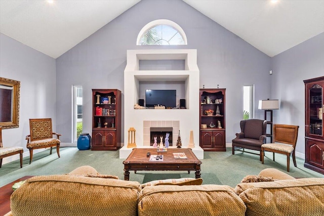 4276 Calinda Ln Apt 138, Niceville, FL 32578 - living area with high vaulted ceiling, carpet flooring, and a tiled fireplace