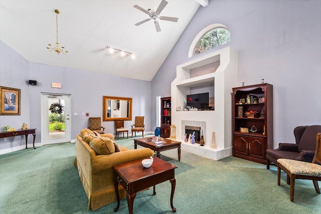 4276 Calinda Ln Apt 138, Niceville, FL 32578 - living area featuring high vaulted ceiling, carpet, a ceiling fan, a fireplace, and beamed ceiling