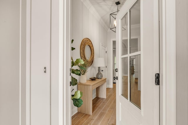 124 Apollo Ave, Freeport, FL 32439 - hallway with ornamental molding and light wood-style floors