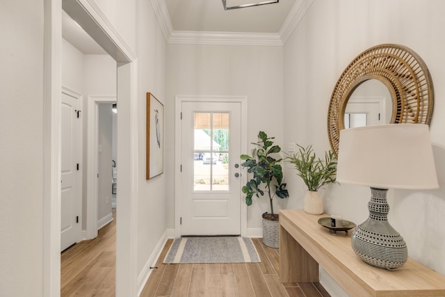 124 Apollo Ave, Freeport, FL 32439 - entryway featuring light wood-type flooring and crown molding