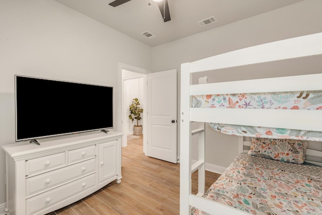124 Apollo Ave, Freeport, FL 32439 - bedroom with light wood finished floors and a ceiling fan