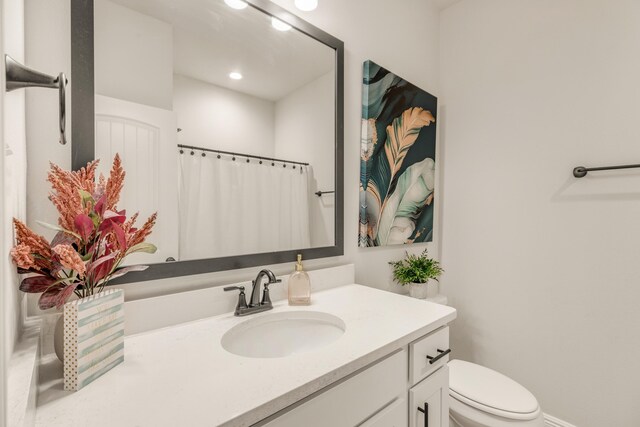 124 Apollo Ave, Freeport, FL 32439 - full bath with vanity, a shower with shower curtain, and recessed lighting