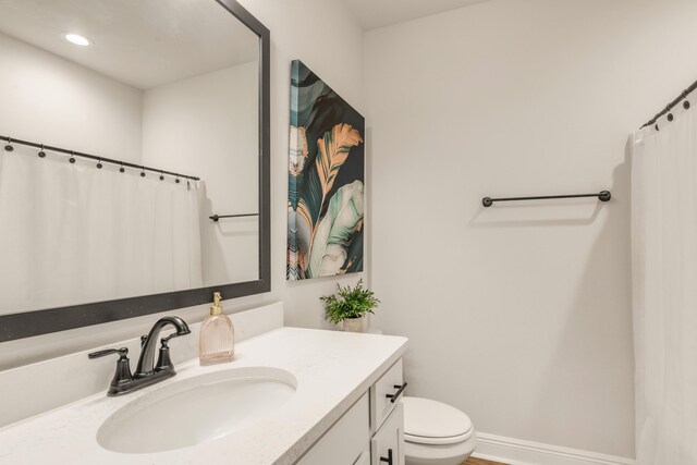 124 Apollo Ave, Freeport, FL 32439 - bathroom featuring vanity, recessed lighting, and curtained shower