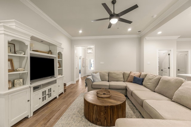 124 Apollo Ave, Freeport, FL 32439 - living area featuring ceiling fan, crown molding, wood finished floors, and recessed lighting