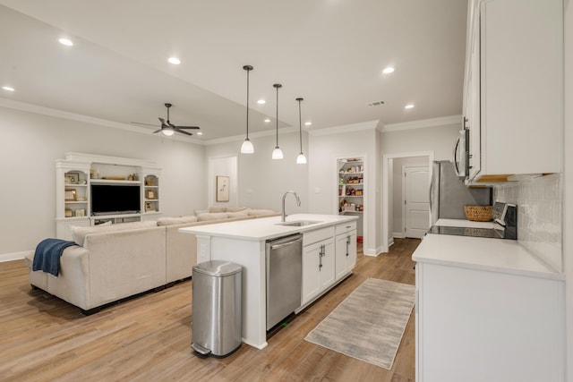124 Apollo Ave, Freeport, FL 32439 - kitchen with dishwasher, ceiling fan, ornamental molding, white cabinets, and light countertops