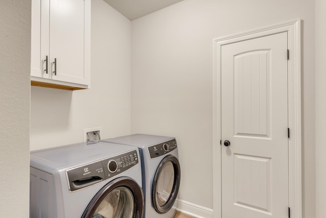 124 Apollo Ave, Freeport, FL 32439 - washroom with cabinet space and washing machine and dryer