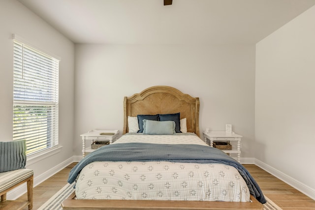 124 Apollo Ave, Freeport, FL 32439 - bedroom featuring wood finished floors