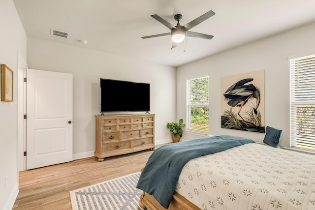 124 Apollo Ave, Freeport, FL 32439 - bedroom with light wood-type flooring and a ceiling fan