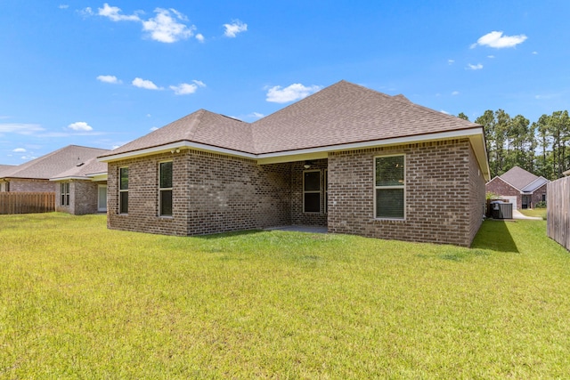 124 Apollo Ave, Freeport, FL 32439 - back of property featuring brick siding and roof with shingles