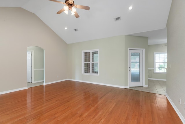 5552 Frontier Dr, Crestview, FL 32536 - unfurnished room featuring a ceiling fan, arched walkways, light wood-style flooring, recessed lighting, and high vaulted ceiling