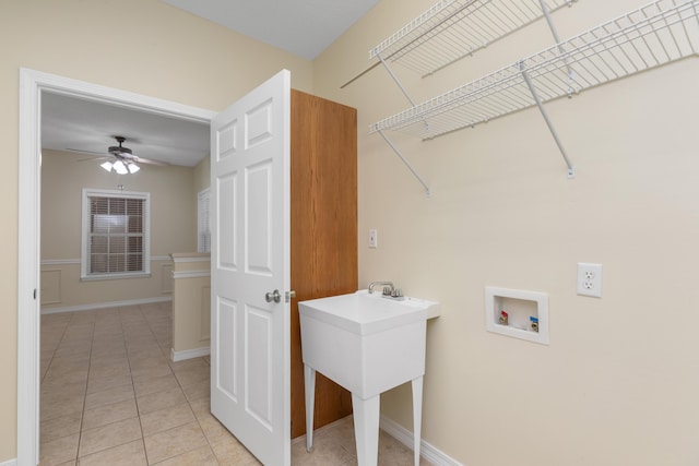 5552 Frontier Dr, Crestview, FL 32536 - washroom featuring washer hookup, light tile patterned floors, and a ceiling fan