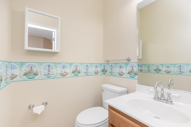 5552 Frontier Dr, Crestview, FL 32536 - half bathroom featuring toilet and vanity