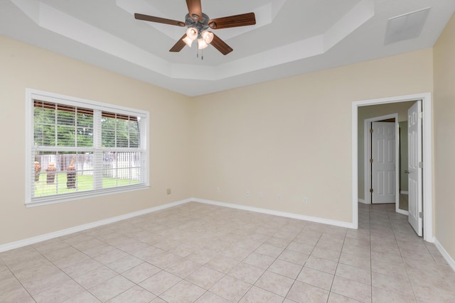 5552 Frontier Dr, Crestview, FL 32536 - unfurnished room with a tray ceiling, ceiling fan, and light tile patterned flooring