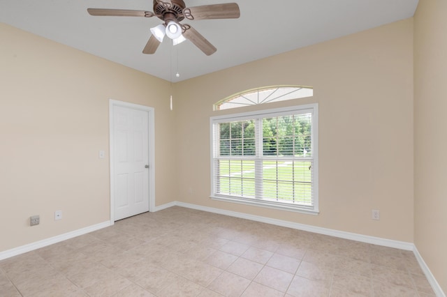 5552 Frontier Dr, Crestview, FL 32536 - spare room featuring light tile patterned floors and a ceiling fan
