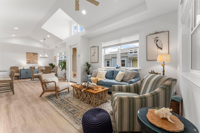 8668 Shell Sink Dr, Panama City Beach, FL 32413 - living area with healthy amount of natural light, light wood finished floors, recessed lighting, ceiling fan, and high vaulted ceiling