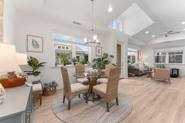 8668 Shell Sink Dr, Panama City Beach, FL 32413 - dining area featuring light wood-type flooring, recessed lighting, a chandelier, a ceiling fan, and vaulted ceiling