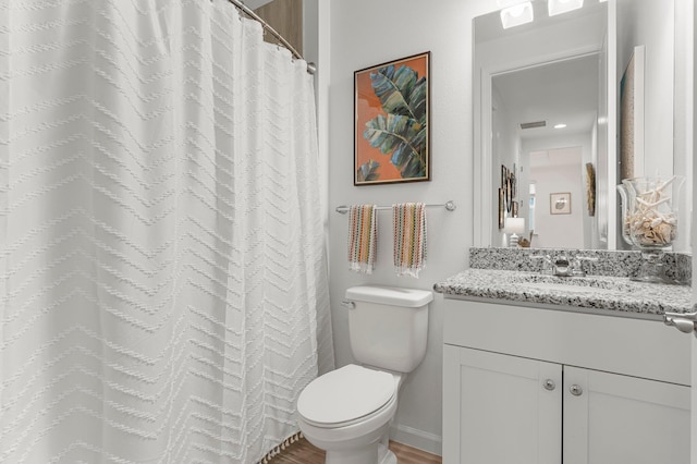 8668 Shell Sink Dr, Panama City Beach, FL 32413 - bathroom featuring vanity, wood finished floors, and curtained shower