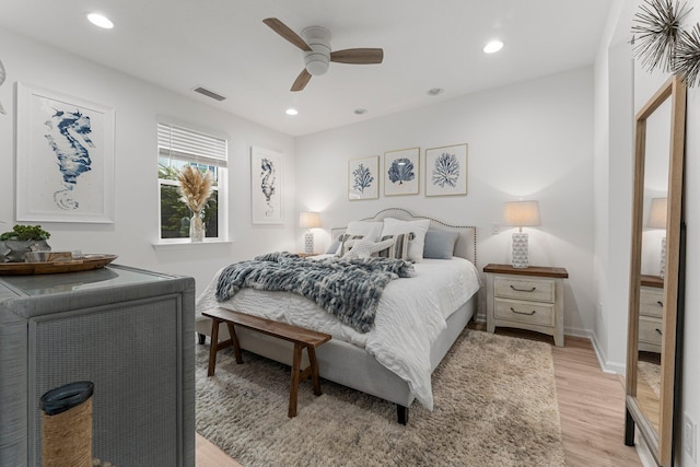 8668 Shell Sink Dr, Panama City Beach, FL 32413 - bedroom with light wood-style flooring, recessed lighting, and ceiling fan