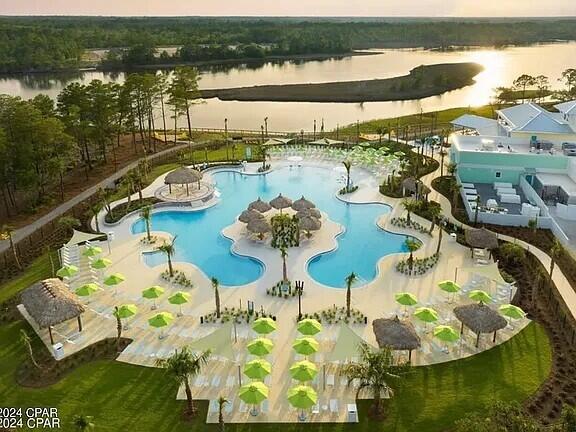8668 Shell Sink Dr, Panama City Beach, FL 32413 - view of swimming pool featuring a water view
