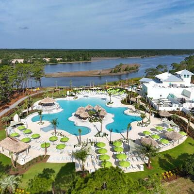 8668 Shell Sink Dr, Panama City Beach, FL 32413 - bird's eye view of a nearby body of water and a pool