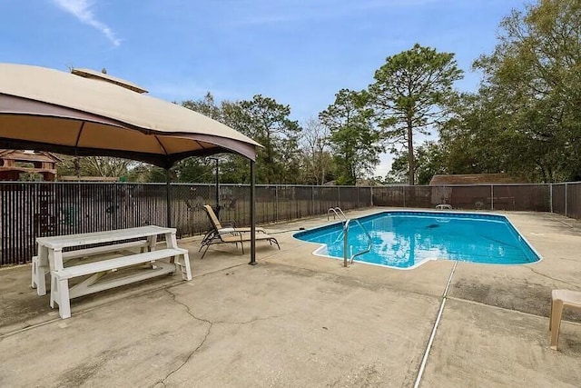 3180 Palmetta Ave, Crestview, FL 32539 - view of swimming pool featuring a fenced backyard, a patio area, and a gazebo