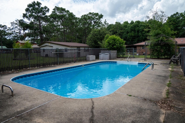 3180 Palmetta Ave, Crestview, FL 32539 - view of swimming pool featuring a patio area