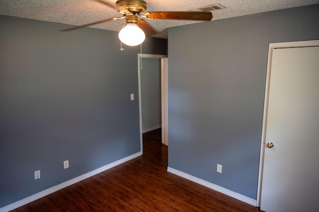 3180 Palmetta Ave, Crestview, FL 32539 - unfurnished room with ceiling fan, wood finished floors, and a textured ceiling
