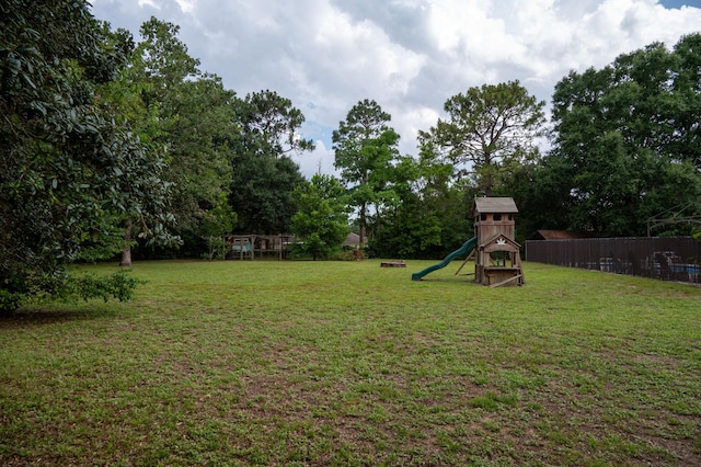 3180 Palmetta Ave, Crestview, FL 32539 - view of yard featuring a playground and view of scattered trees