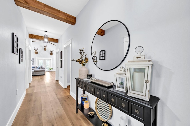 52 Lazy Bone St, Vernon, FL 32462 - hallway with beam ceiling, light wood finished floors, and french doors