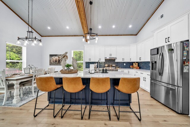 52 Lazy Bone St, Vernon, FL 32462 - kitchen with stainless steel appliances, light countertops, a chandelier, an island with sink, and recessed lighting