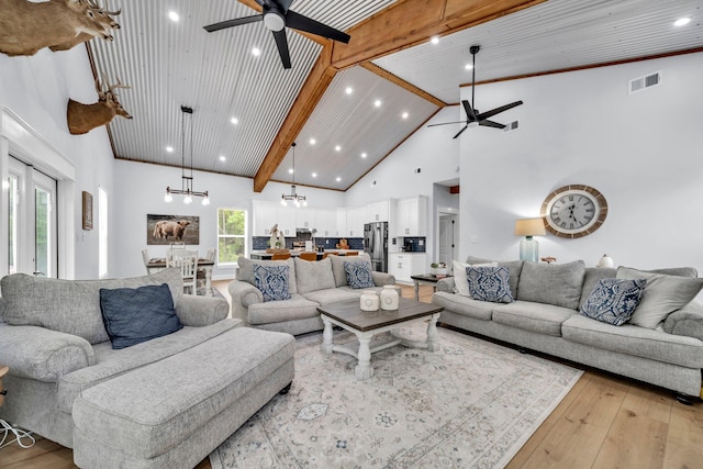 52 Lazy Bone St, Vernon, FL 32462 - living room with a ceiling fan, light wood-type flooring, high vaulted ceiling, beamed ceiling, and recessed lighting