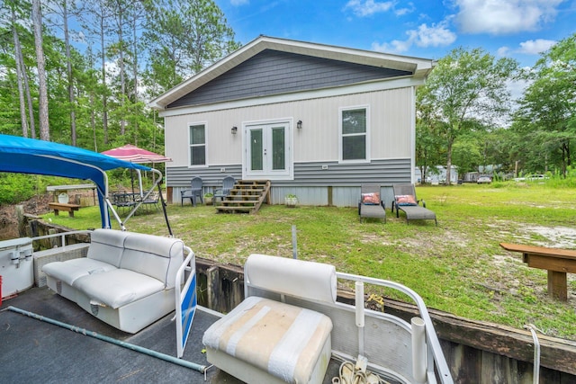 52 Lazy Bone St, Vernon, FL 32462 - back of house featuring french doors and a lawn