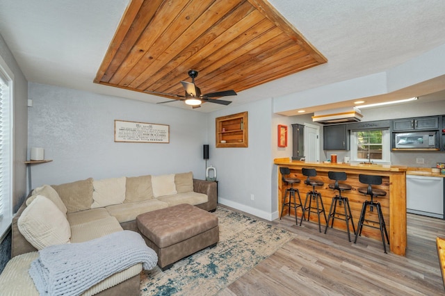 201 Anderson St, Crestview, FL 32536 - living room with wood finished floors and a ceiling fan