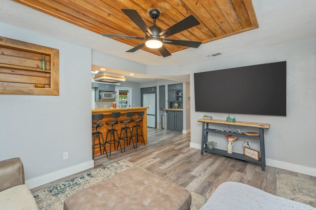 201 Anderson St, Crestview, FL 32536 - living room featuring ceiling fan, wood finished floors, and wood ceiling