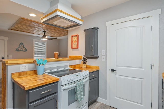 201 Anderson St, Crestview, FL 32536 - kitchen featuring white electric range, gray cabinetry, wood counters, and recessed lighting