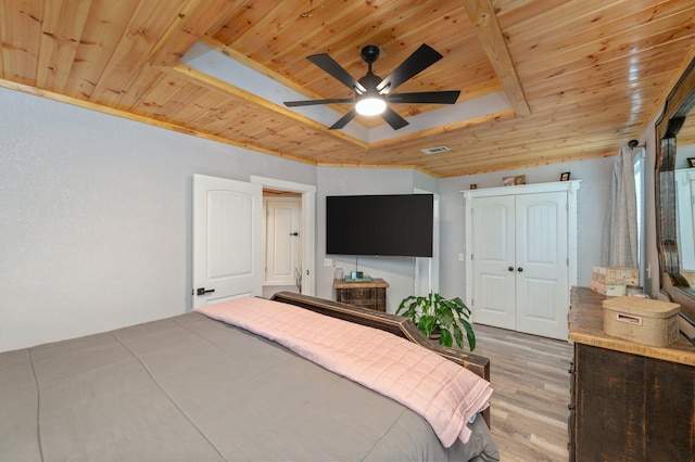 201 Anderson St, Crestview, FL 32536 - bedroom featuring wooden ceiling, a raised ceiling, light wood-style flooring, a ceiling fan, and a closet