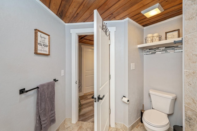 201 Anderson St, Crestview, FL 32536 - bathroom featuring wooden ceiling, ornamental molding, and stone finish floors
