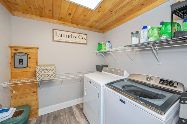 201 Anderson St, Crestview, FL 32536 - laundry area featuring independent washer and dryer, light wood finished floors, and wooden ceiling