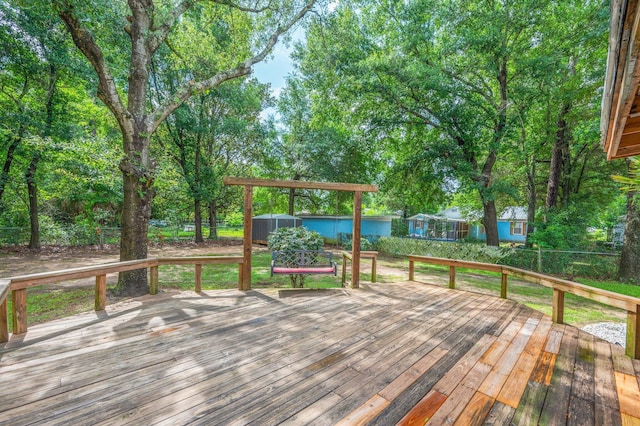 201 Anderson St, Crestview, FL 32536 - wooden terrace with a storage shed