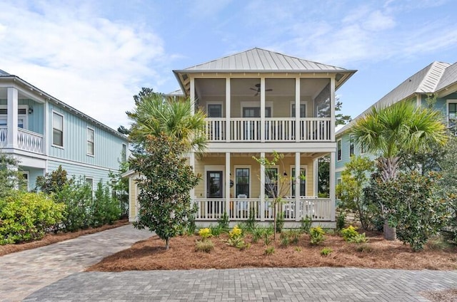 137 Cabana Trl, Santa Rosa Beach, FL 32459 - view of front of home with covered porch, a standing seam roof, ceiling fan, and a metal roof