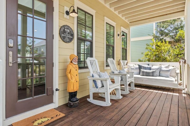137 Cabana Trl, Santa Rosa Beach, FL 32459 - wooden porch featuring an outdoor hangout area