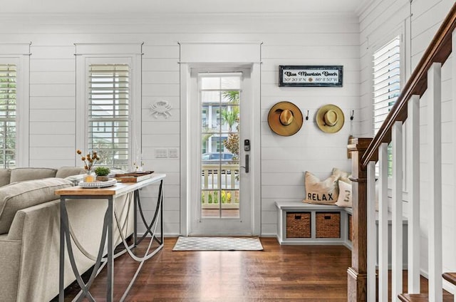 137 Cabana Trl, Santa Rosa Beach, FL 32459 - foyer featuring dark wood-type flooring, stairway, and crown molding