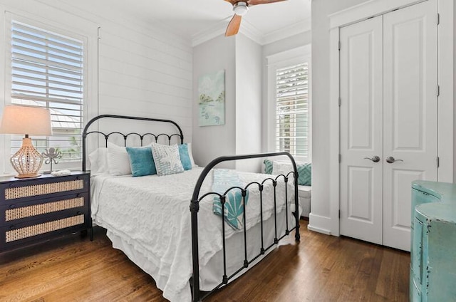 137 Cabana Trl, Santa Rosa Beach, FL 32459 - bedroom with wood finished floors, ornamental molding, a closet, and ceiling fan