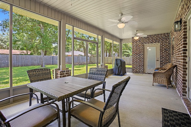 3112 Evans Ave, Navarre, FL 32566 - sunroom featuring ceiling fan and plenty of natural light
