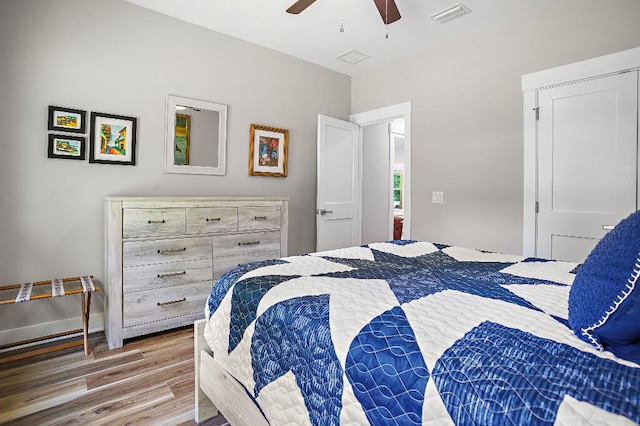3112 Evans Ave, Navarre, FL 32566 - bedroom with wood finished floors and ceiling fan