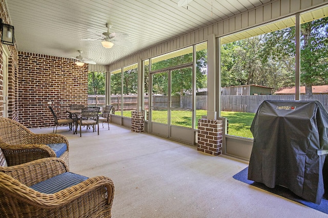 3112 Evans Ave, Navarre, FL 32566 - sunroom / solarium with ceiling fan and outdoor dining space